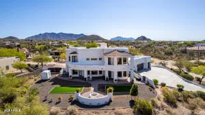 an aerial view of a house with a garden view