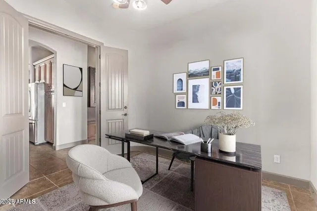 a workspace with furniture and window