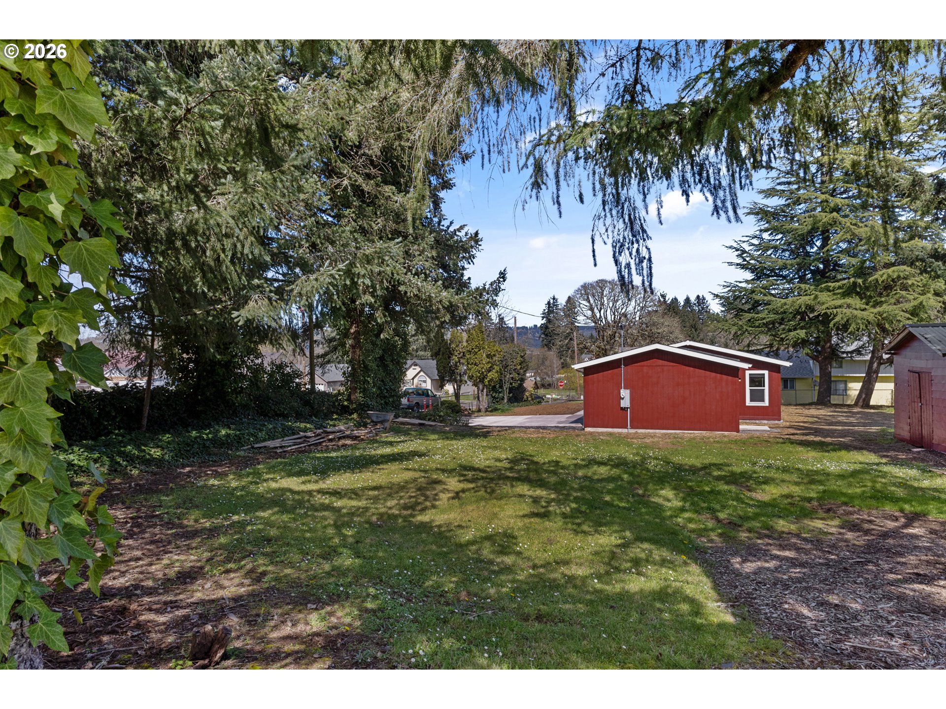 365 Mountain View Road Sweet Home, OR 97386 - Photo 32 of 32 a view of a yard with a tree