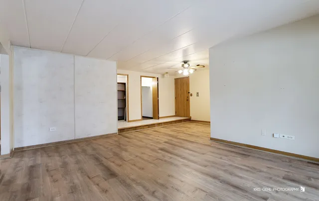 a view of a livingroom with wooden floor