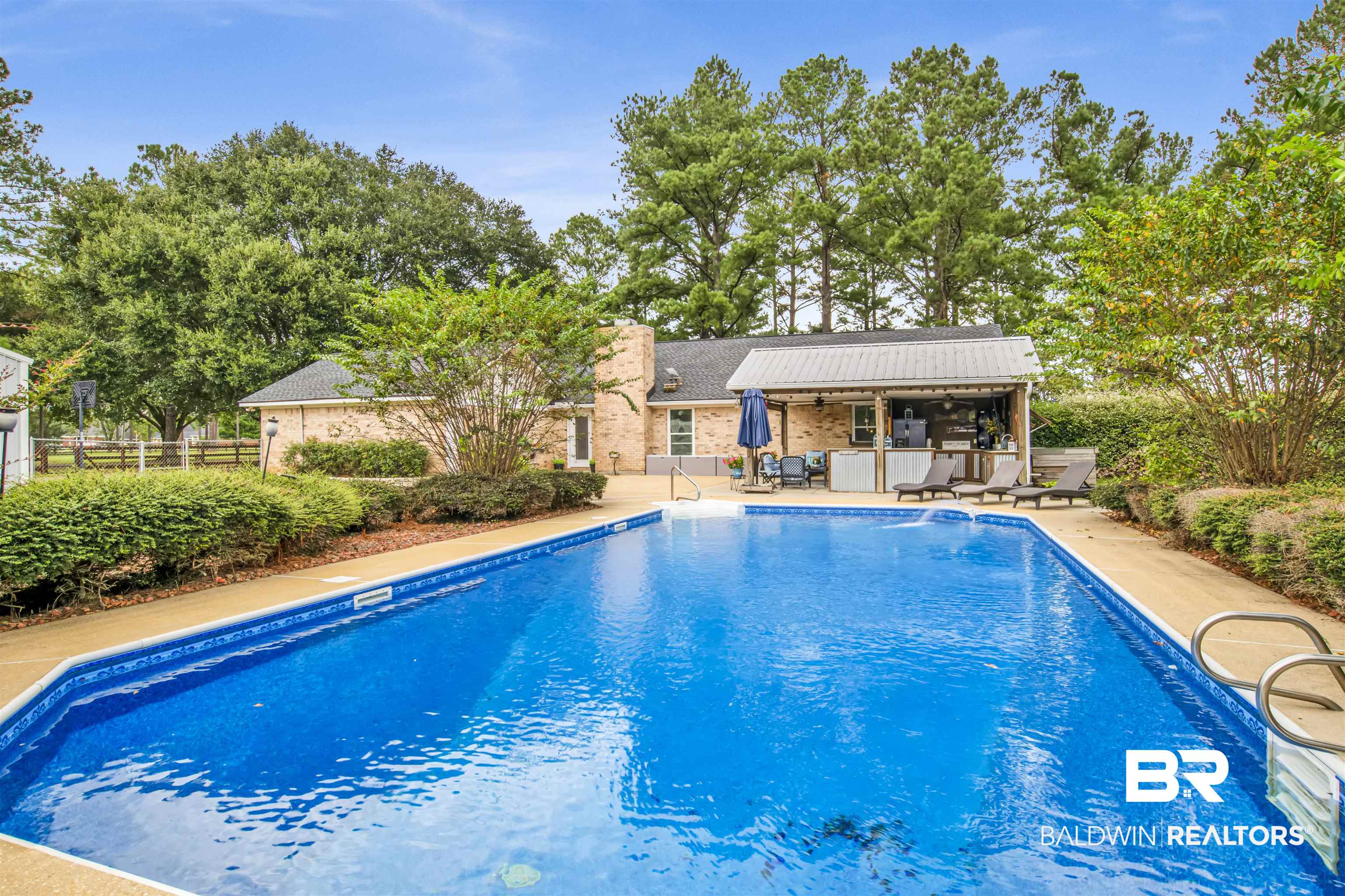 13385 Tom Gaston Road Mobile, AL 36695 - Photo 29 of 42 View of swimming pool featuring a patio area