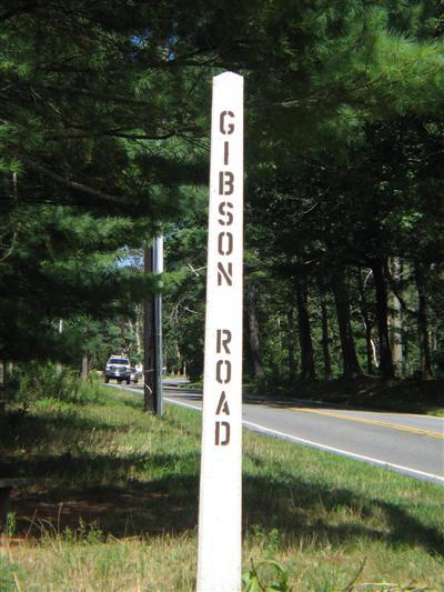 Undisclosed Address Orleans, MA 02653 - Photo 8 of 9 a sign board with yard and green space