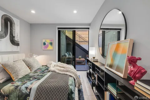 a view of a balcony with furniture