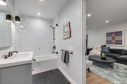 an aerial view of residential houses with yard