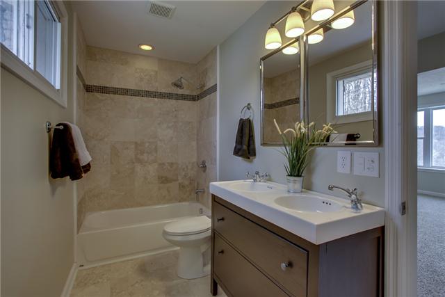 2951 Ivey Point Road Goodlettsville, TN 37072 - Photo 14 of 20 The Master Bath Features New Tile Surround, Double Vanities and Mirrors and feels like a resort!