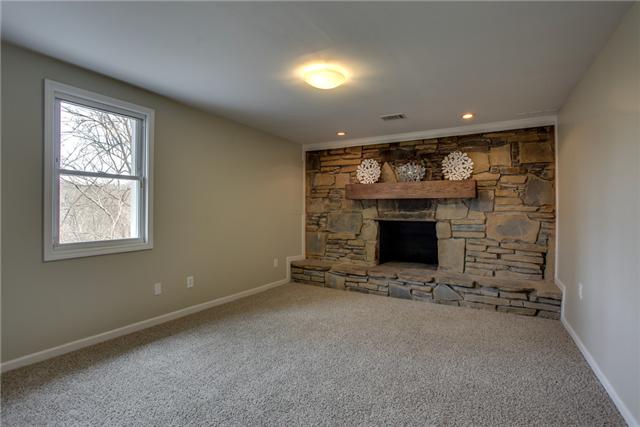 2951 Ivey Point Road Goodlettsville, TN 37072 - Photo 15 of 20 3rd Bedroom features a Natural Stone Fireplace with Large Mantel. Don't need the extra Bedroom? Would make a great Den or Media Room