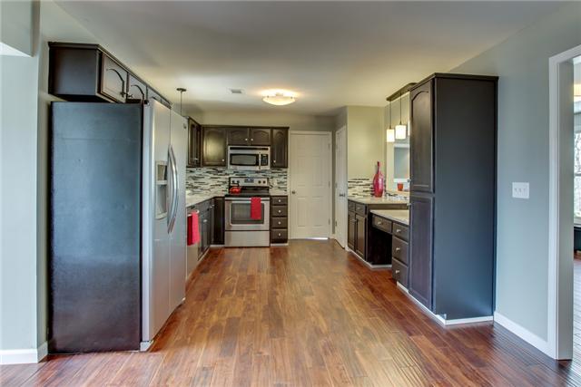 2951 Ivey Point Road Goodlettsville, TN 37072 - Photo 5 of 20 Must See this Kitchen to Believe it! Granite Counters, Handscraped Hardwoods continue here, Stainless Steel Appliances, Custom Lighting.