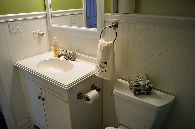 244 North Ridgemoor Avenue Mundelein, IL 60060 - Photo 5 of 10 a bathroom with a sink toilet and a mirror