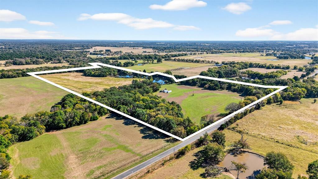 912 East Bewley Road Whitesboro, TX 76273 - Photo 3 of 30 a view of a swimming pool with a balcony