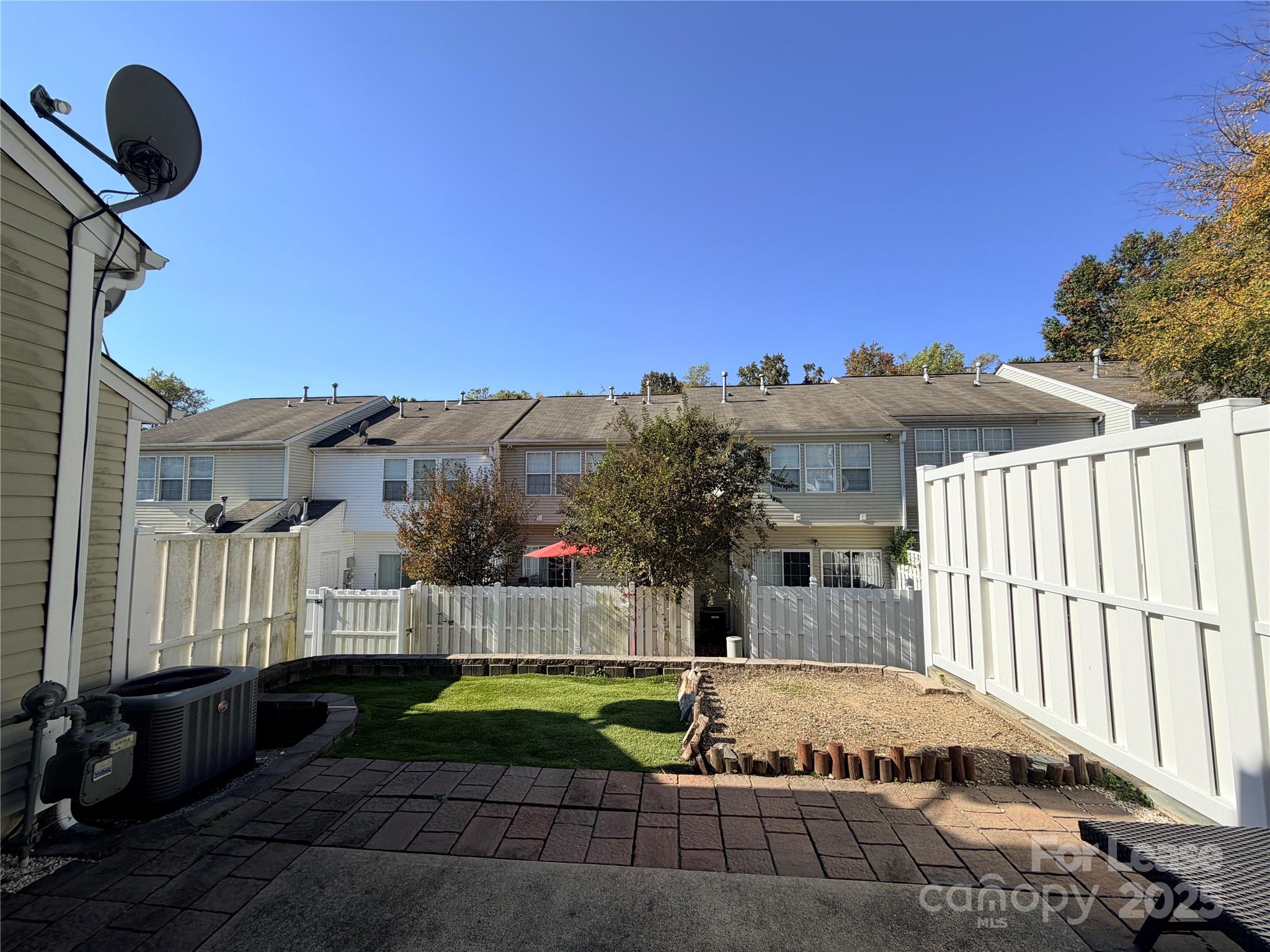 6836 Rothchild Drive Charlotte, NC 28270 - Photo 13 of 25 a view of a house with backyard and porch