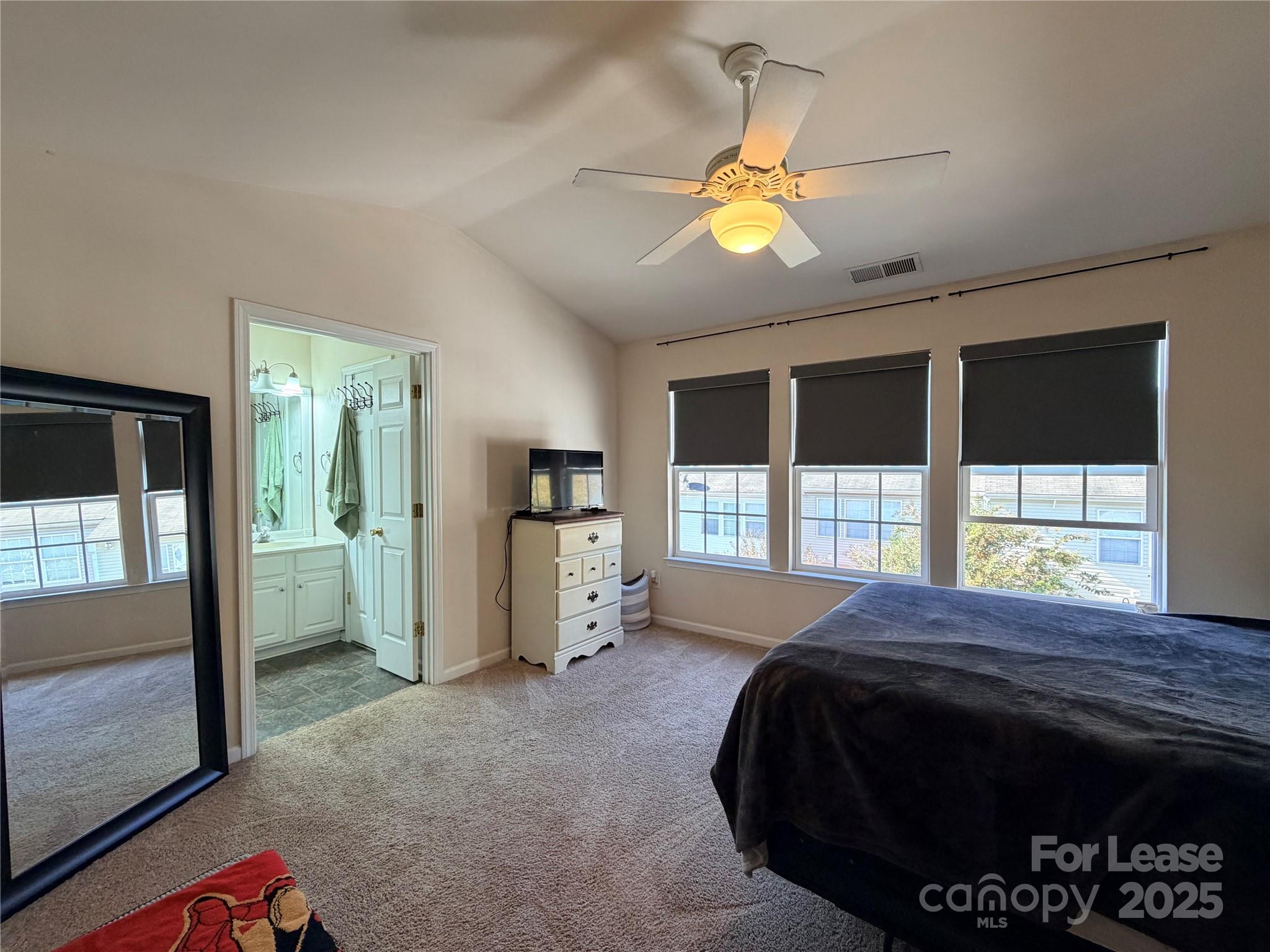 6836 Rothchild Drive Charlotte, NC 28270 - Photo 19 of 25 a bedroom with a bed and a large window