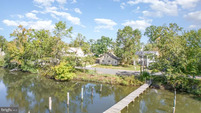 an aerial view of a house having yard