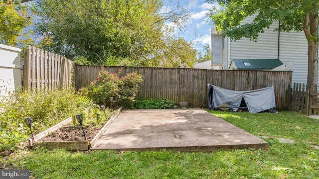 an aerial view of residential house with outdoor space and lake view