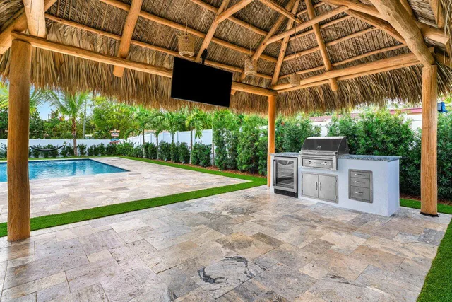 a view of a swimming pool with a patio