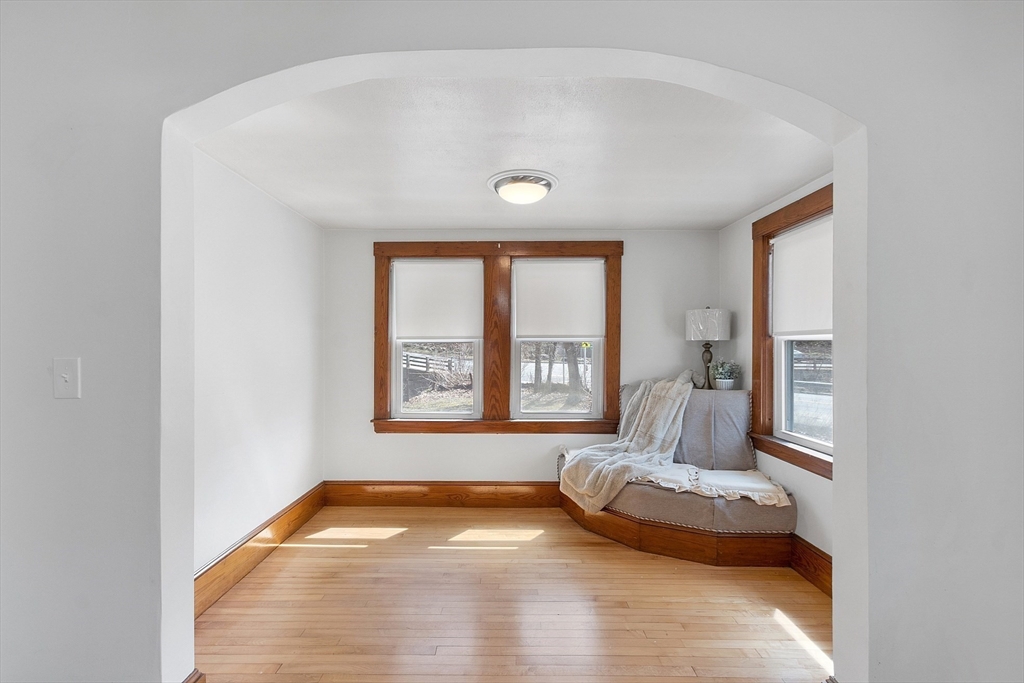 48 Mill Street Maynard, MA 01754 - Photo 17 of 31 a room with a bed and a window