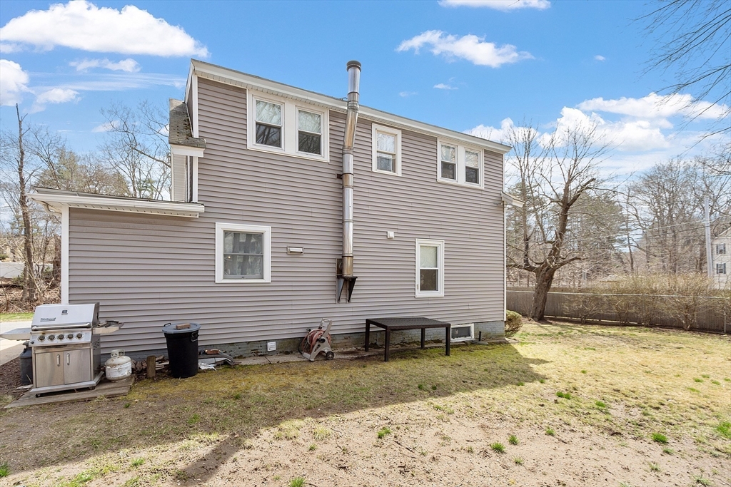 48 Mill Street Maynard, MA 01754 - Photo 27 of 31 a view of a house with snow on the roof