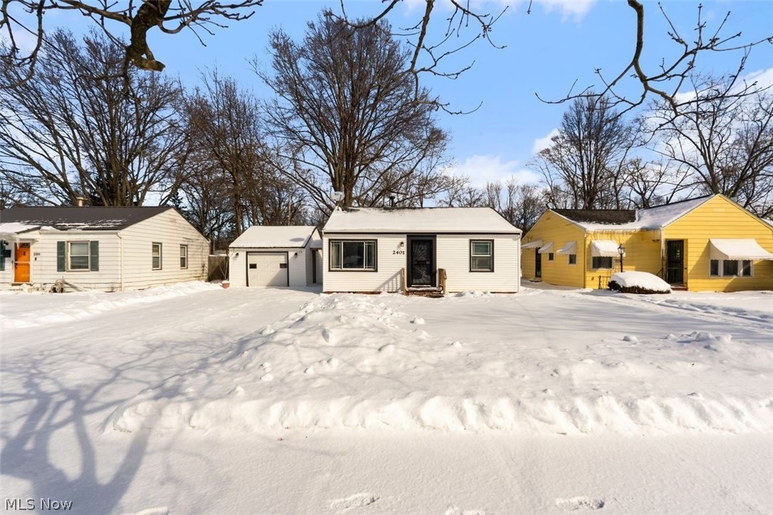 2401 Greenvale Road Cleveland, OH 44121 - Photo 5 of 25 Single story home featuring an outbuilding and a garage