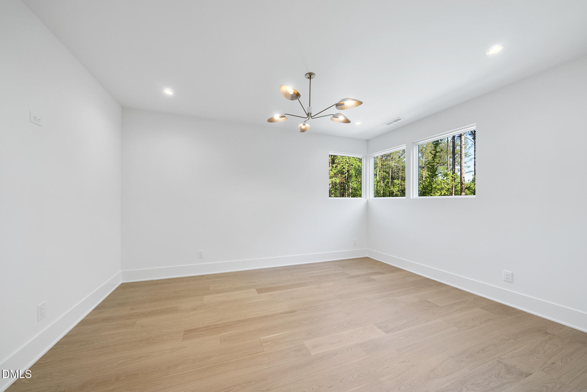 7608 Falls Creek Lane Raleigh, NC 27614 - Photo 48 of 74 wooden floor in an empty room with a window