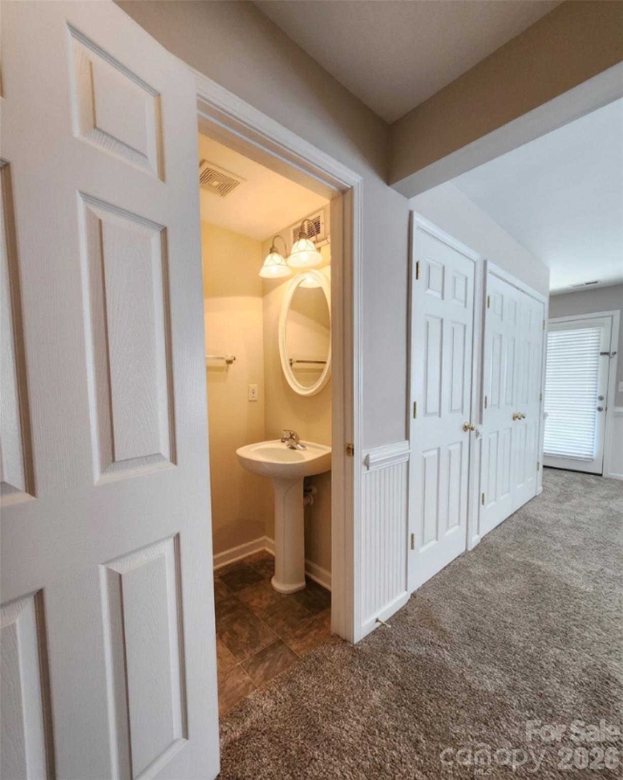 104 Rock Ridge Lane Mount Holly, NC 28120 - Photo 10 of 48 a view of a bathroom with a sink and mirror
