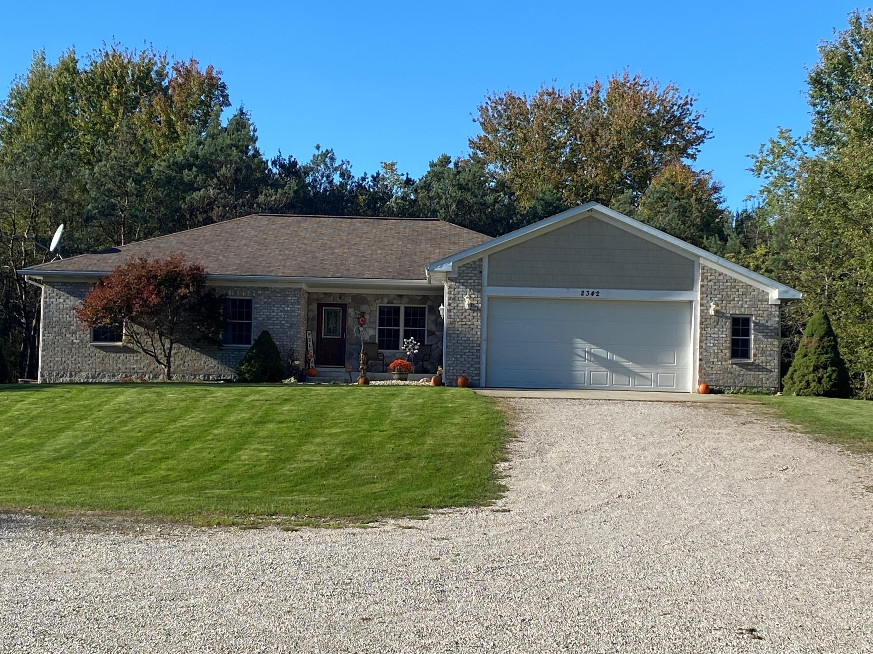2342 East Riley-Thompson Road Twin Lake, MI 49457 - Photo 1 of 33 2