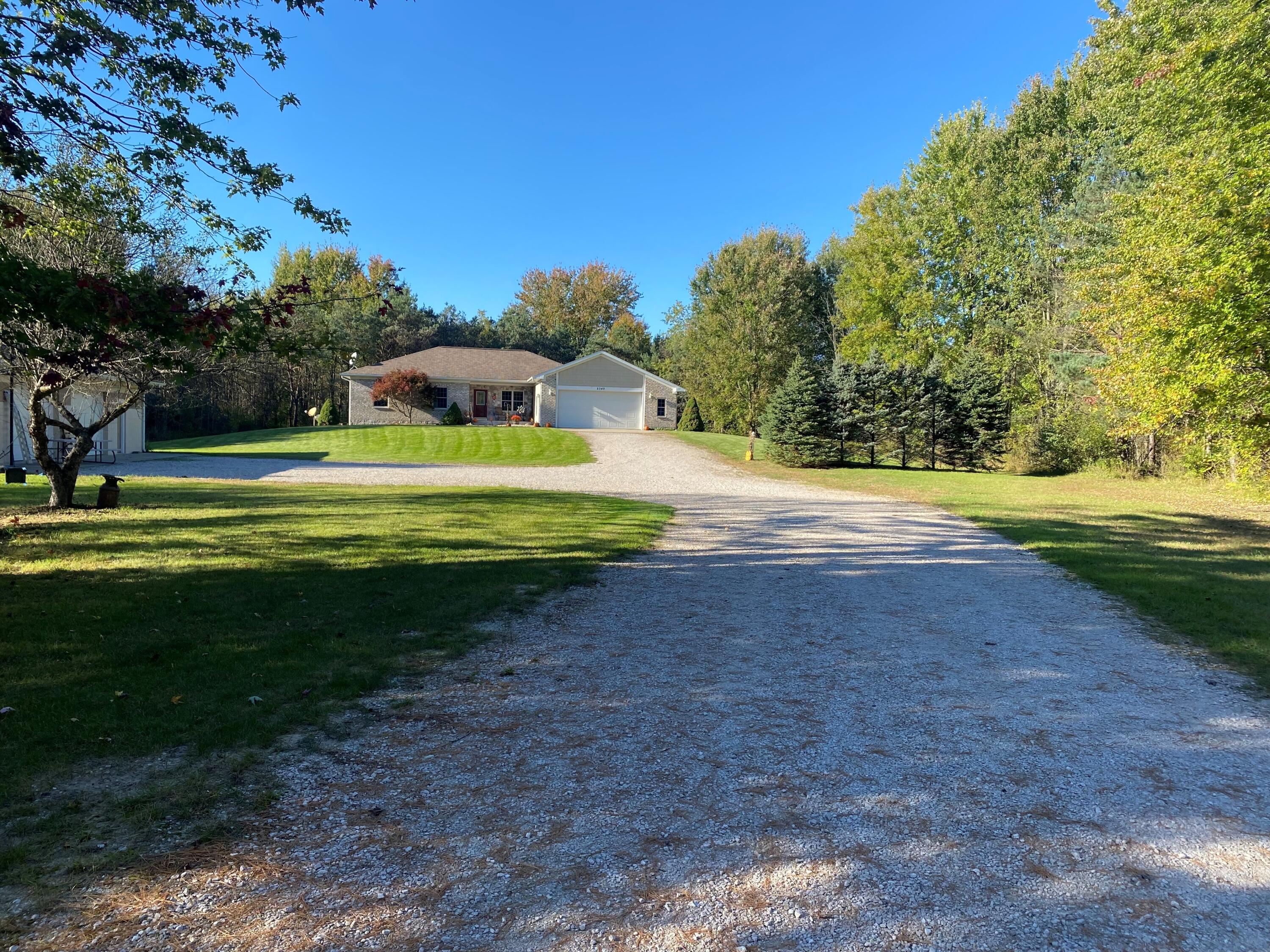 2342 East Riley-Thompson Road Twin Lake, MI 49457 - Photo 2 of 33 1