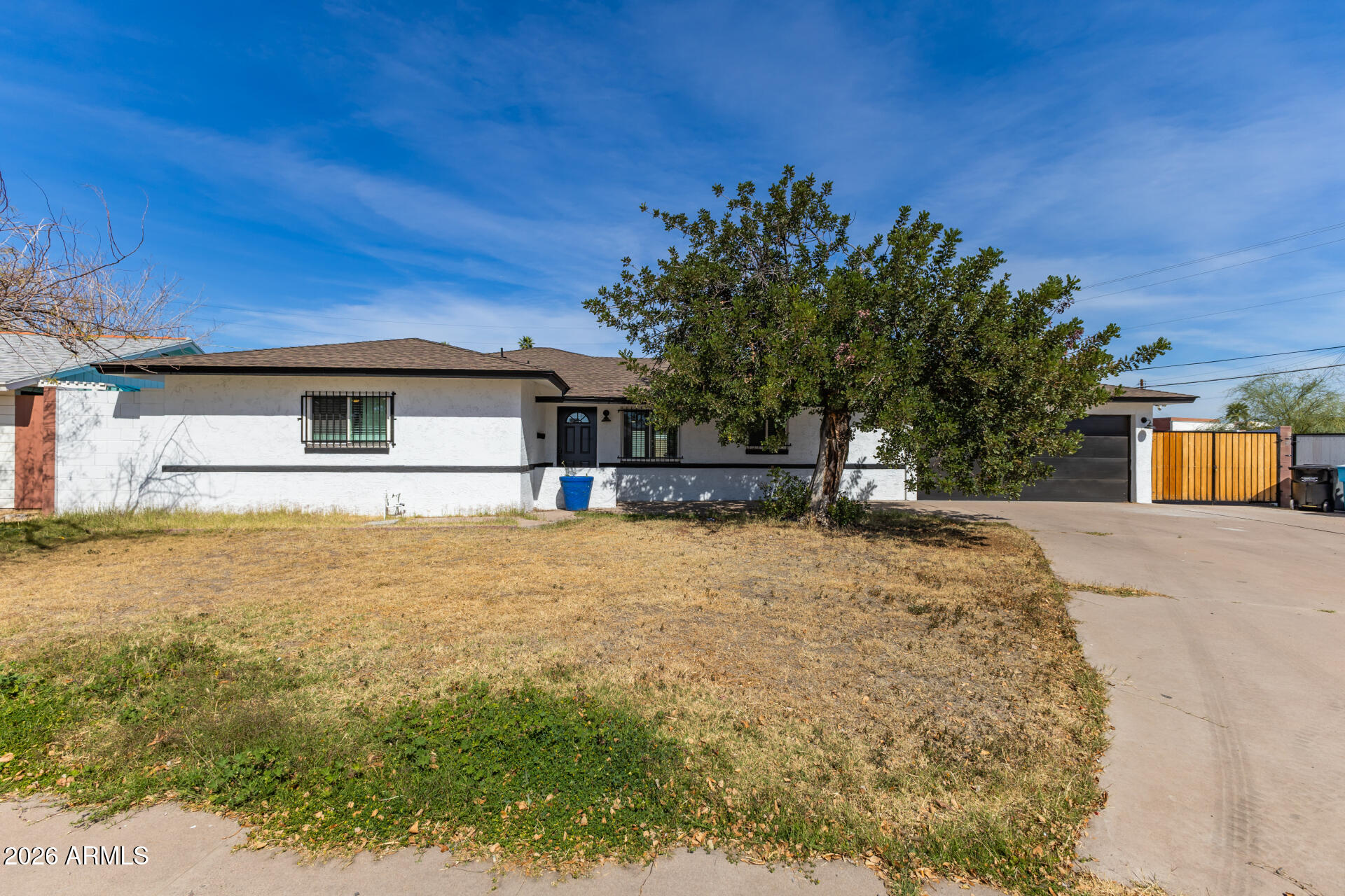 1912 West Roma Avenue Phoenix, AZ 85015 - Photo 1 of 25 a front view of a house with a yard