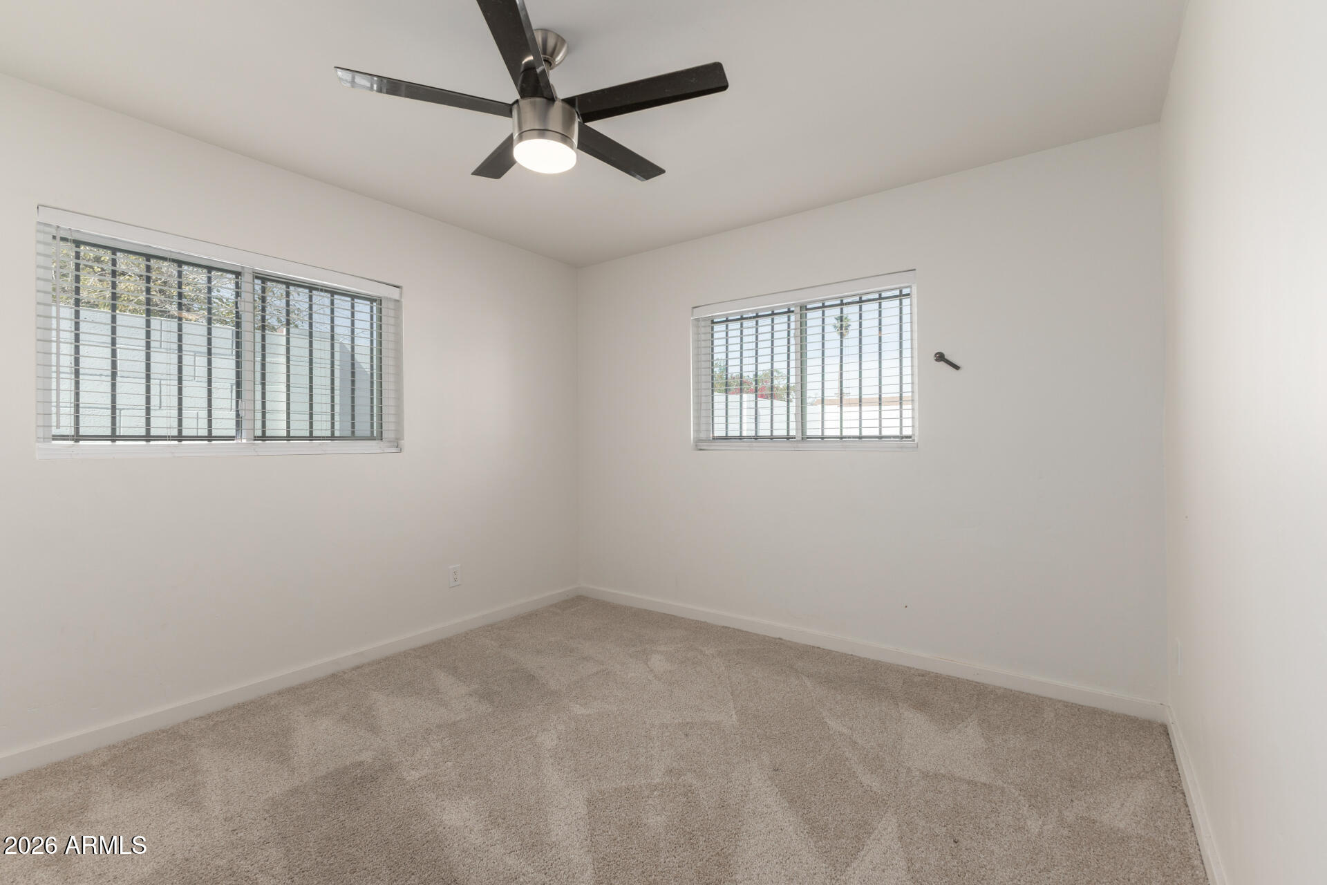 1912 West Roma Avenue Phoenix, AZ 85015 - Photo 16 of 25 a view of an empty room with a window