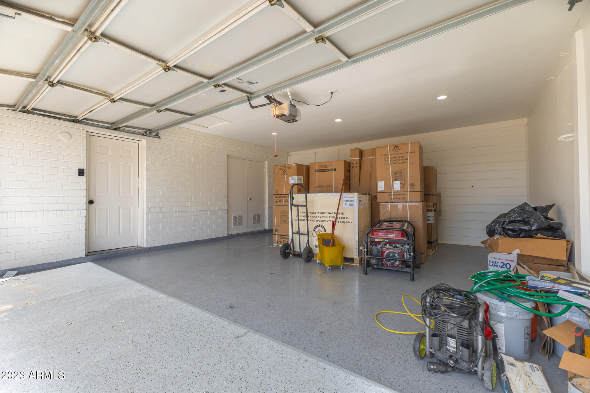 1912 West Roma Avenue Phoenix, AZ 85015 - Photo 19 of 25 a view of a garage with toys