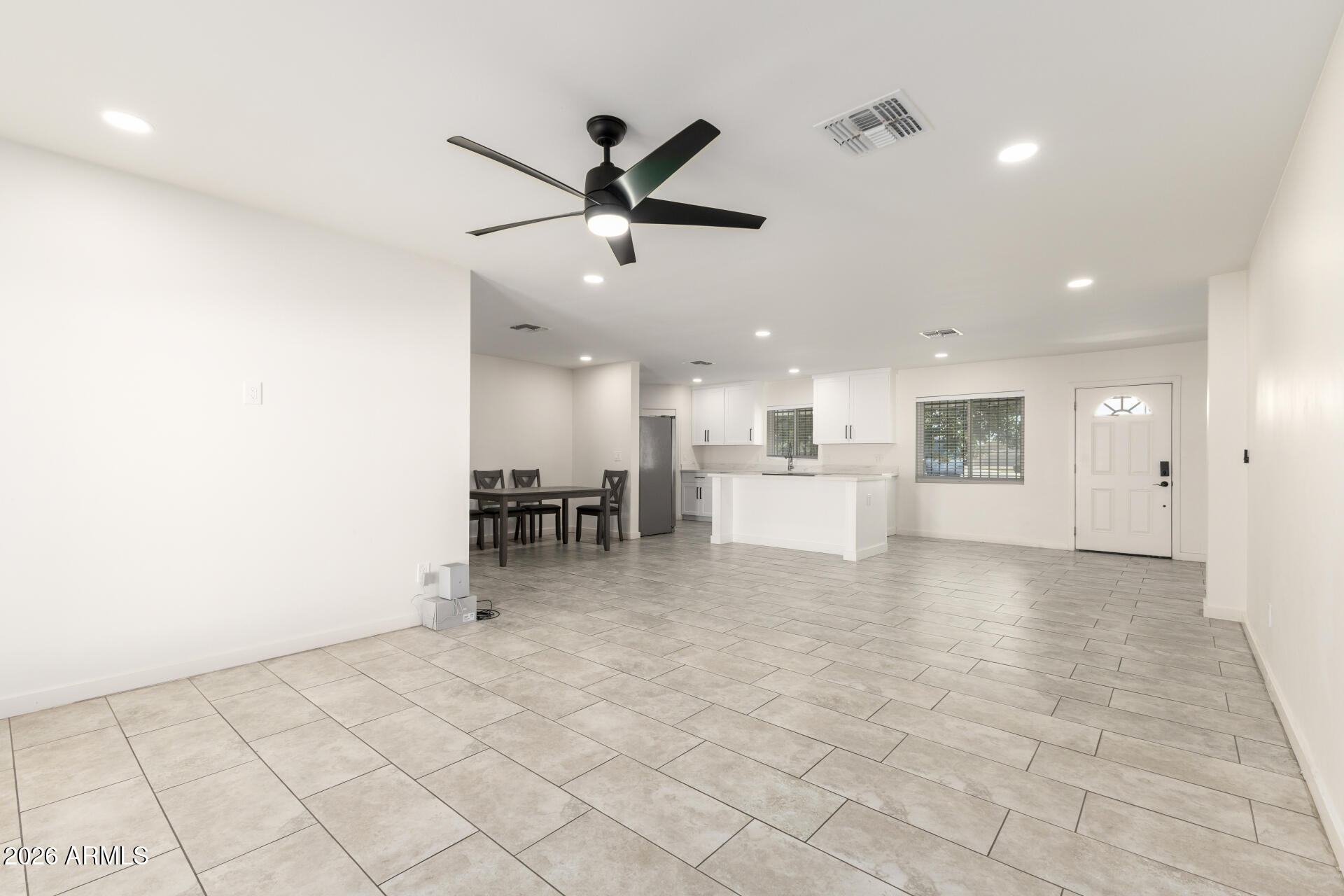 1912 West Roma Avenue Phoenix, AZ 85015 - Photo 6 of 25 a view of an empty room and kitchen view