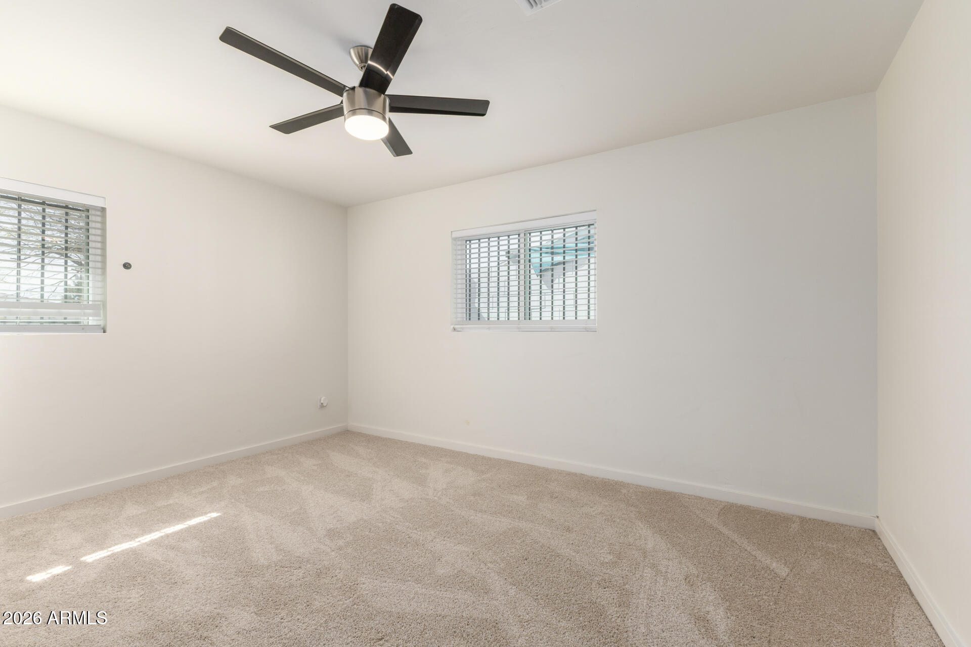 1912 West Roma Avenue Phoenix, AZ 85015 - Photo 10 of 25 a view of an empty room with a window