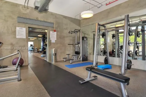 a view of a room with gym equipment