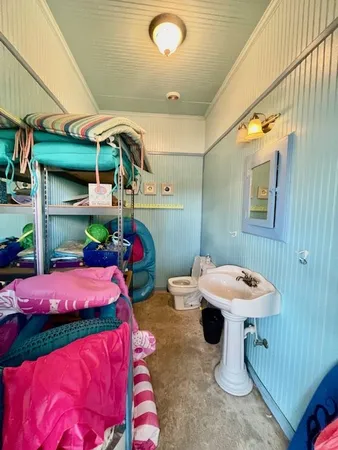 a patio with table and chairs