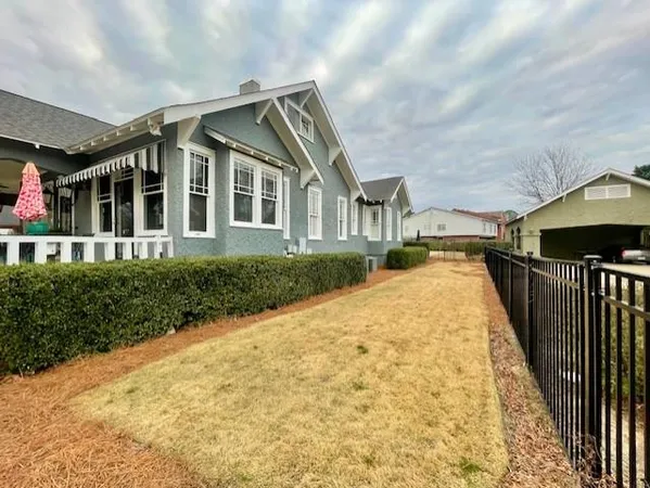 a front view of house along with street