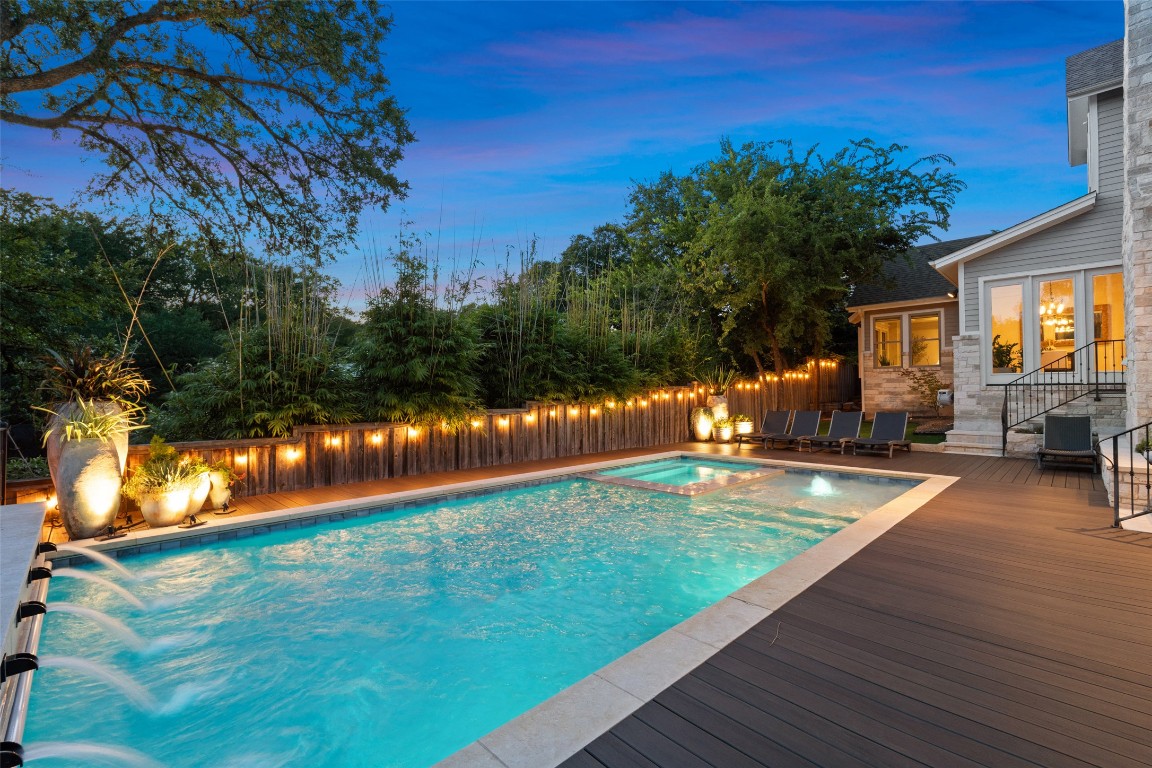 1002 Meriden Lane Austin, TX 78703 - Photo 3 of 35 a view of a swimming pool with an outdoor space and seating area