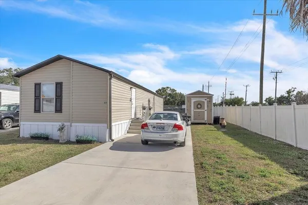 a house view with a backyard space