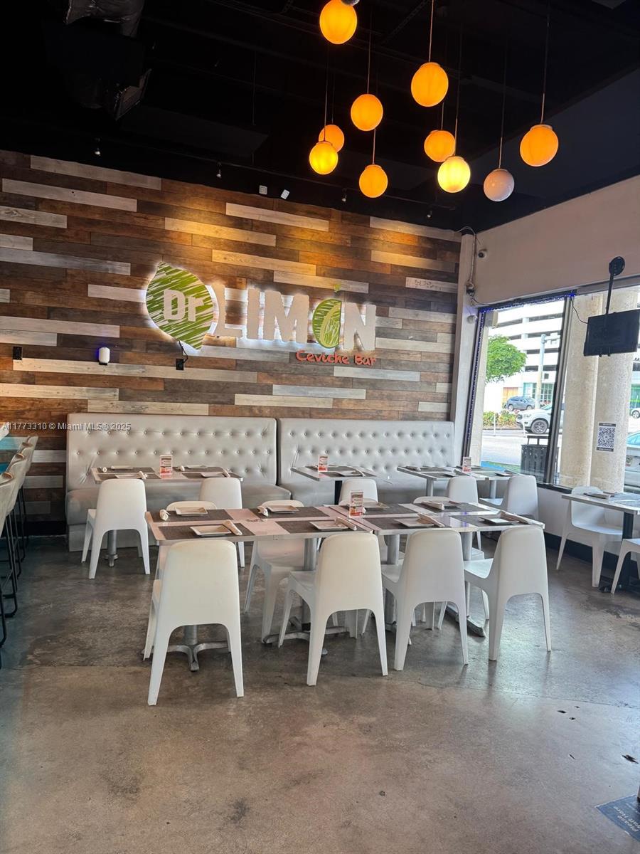 9459 South Dixie Highway Miami, FL 33156 - Photo 7 of 11 a dinning table and chairs in a room
