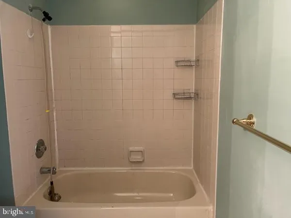 a bathroom with a bathtub
