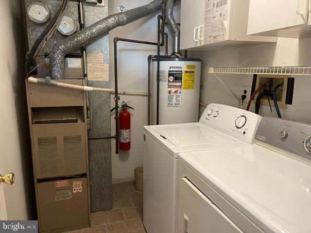27 Stratton Court Robbinsville, NJ 08691 - Photo 22 of 28 a utility room with dryer and washer