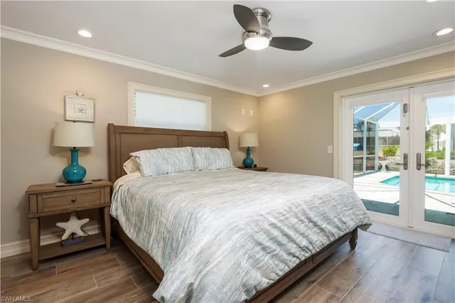 a bedroom with bed and window