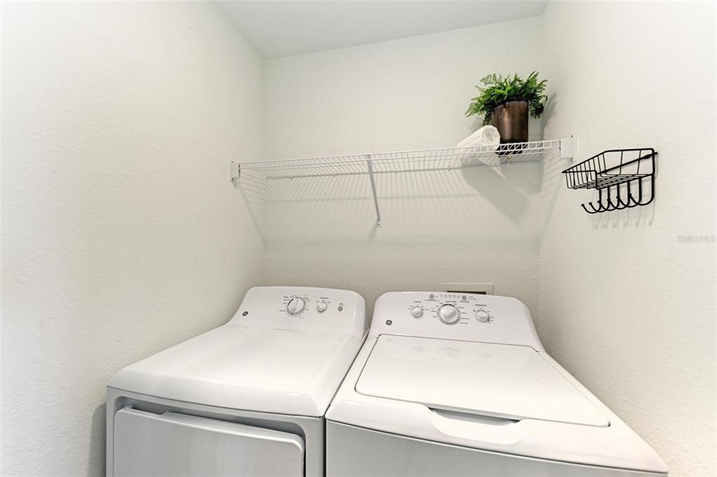 17902 Gawthrop Drive, Unit 307 Lakewood Ranch, FL 34211 - Photo 32 of 74 a utility room with dryer and washer