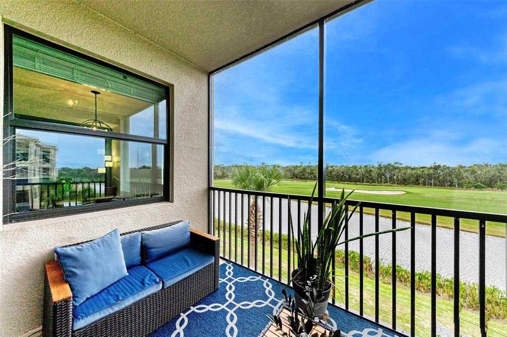 17902 Gawthrop Drive, Unit 307 Lakewood Ranch, FL 34211 - Photo 34 of 74 a balcony with furniture
