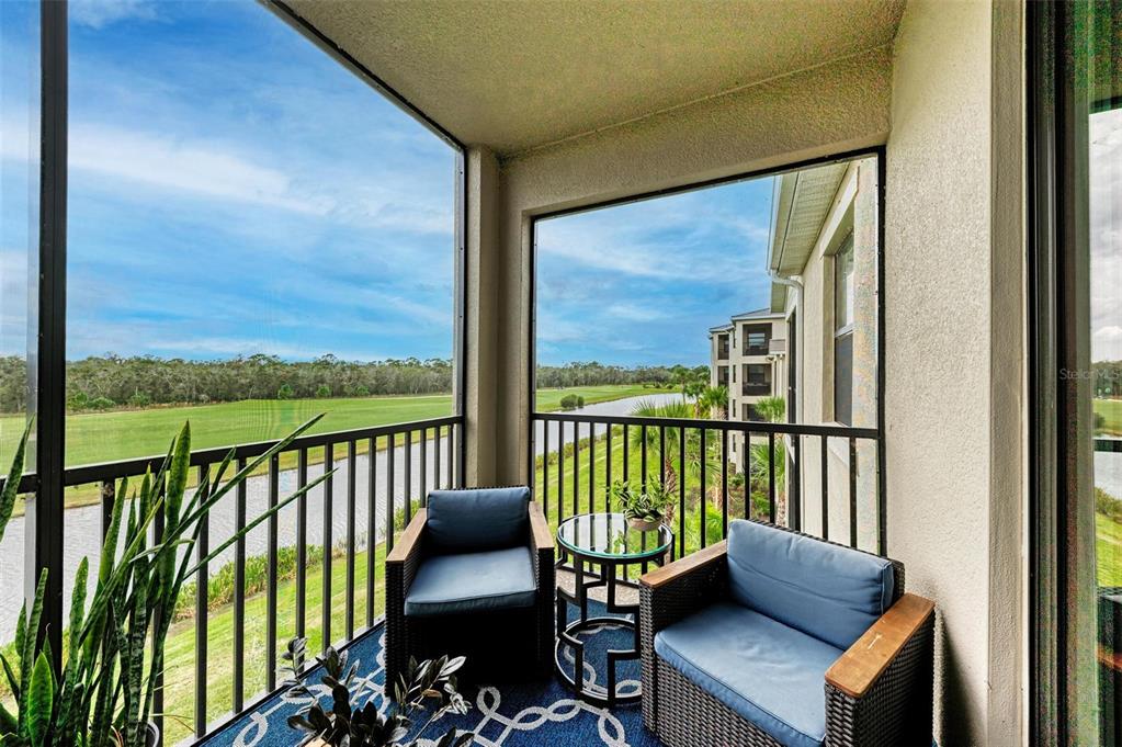 17902 Gawthrop Drive, Unit 307 Lakewood Ranch, FL 34211 - Photo 35 of 74 a view of a balcony with chairs