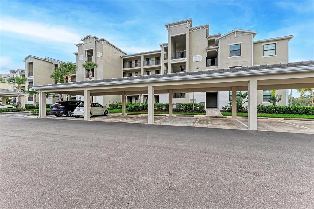 17902 Gawthrop Drive, Unit 307 Lakewood Ranch, FL 34211 - Photo 4 of 74 front view of a building with a street view