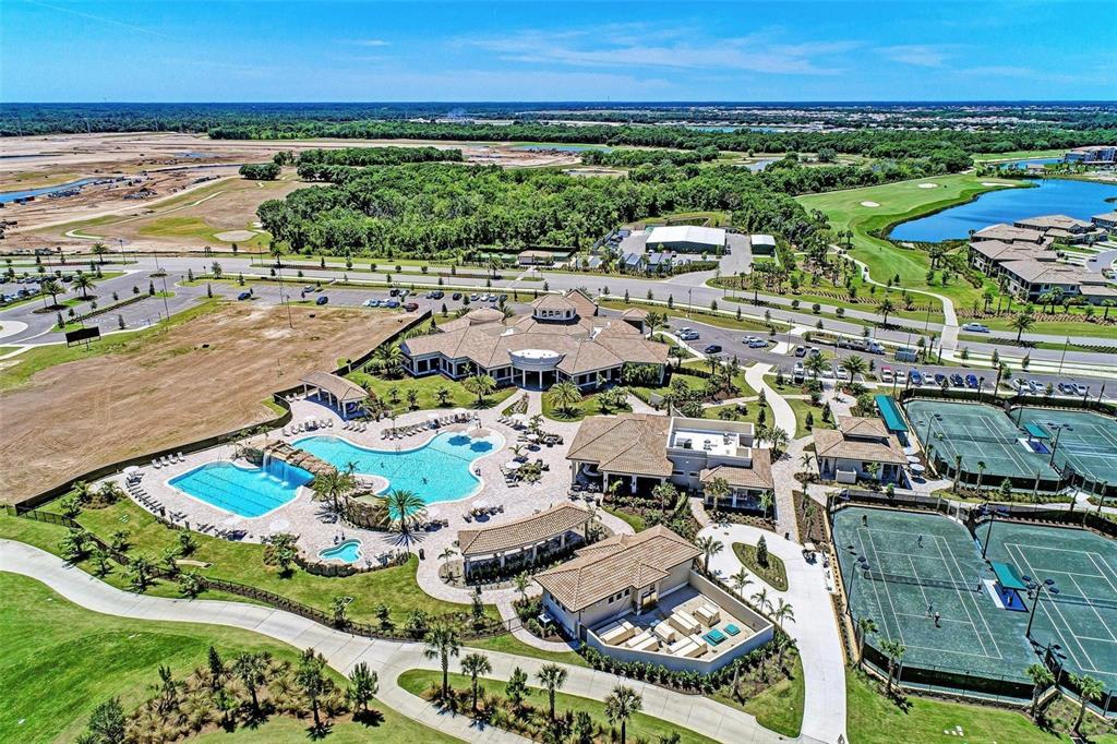 17902 Gawthrop Drive, Unit 307 Lakewood Ranch, FL 34211 - Photo 56 of 74 an aerial view of residential houses and outdoor space