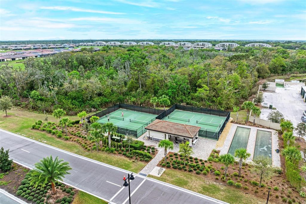 17902 Gawthrop Drive, Unit 307 Lakewood Ranch, FL 34211 - Photo 64 of 74 an aerial view of a house with a yard