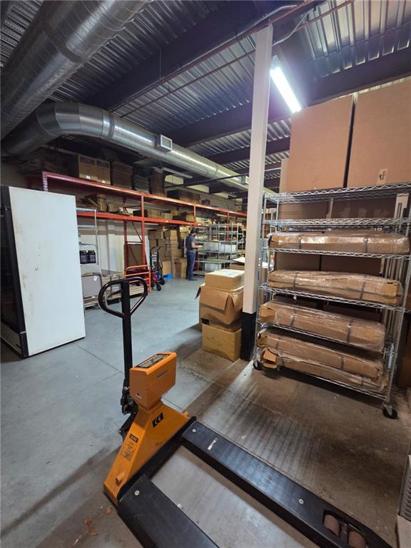 2730 North Berkeley Lake Road Northwest, Unit B1000 Duluth, GA 30096 - Photo 5 of 15 a gym room with gym equipment