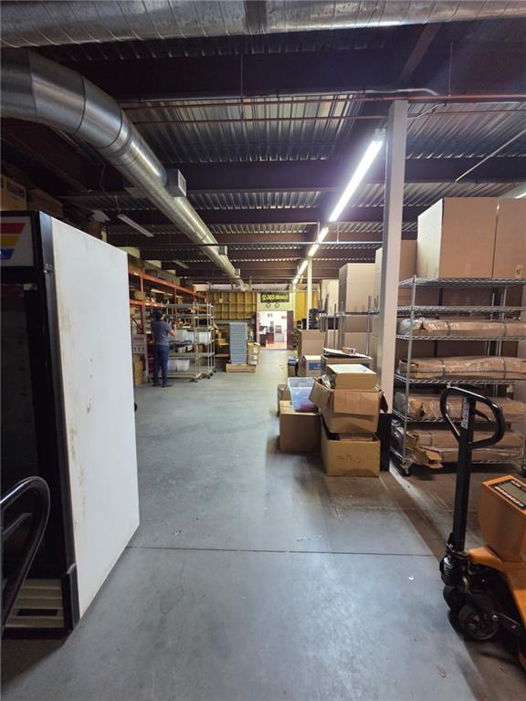 2730 North Berkeley Lake Road Northwest, Unit B1000 Duluth, GA 30096 - Photo 6 of 15 a view of parking garage with cars