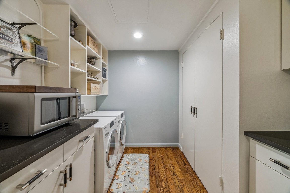 2200 Willowick Road, Unit 4D Houston, TX 77027 - Photo 14 of 36 a kitchen with stainless steel appliances granite countertop a stove and a sink