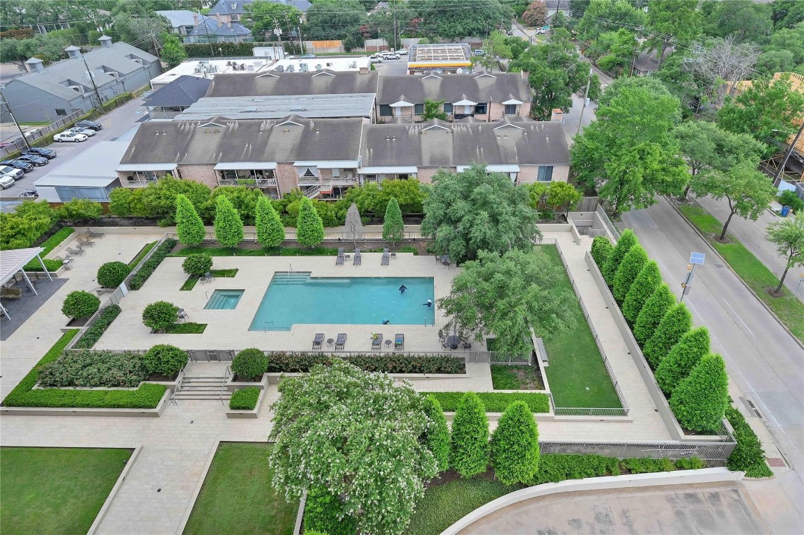 2200 Willowick Road, Unit 4D Houston, TX 77027 - Photo 3 of 36 an aerial view of multiple houses with a yard