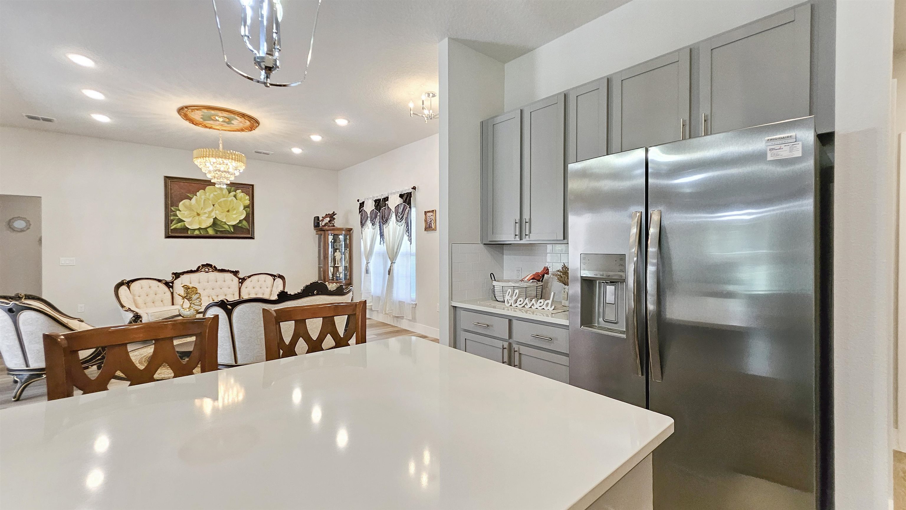 7 Smith Trail Palm Coast, FL 32164 - Photo 14 of 48 a kitchen with refrigerator and a refrigerator